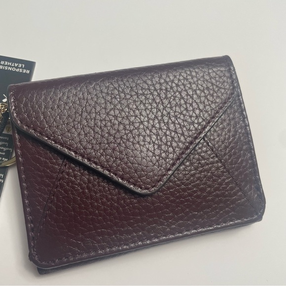 Aimee Kestenberg Handbags - Aimee Kestenberg Zip It Up Trifold Leather Wallet in True Plum